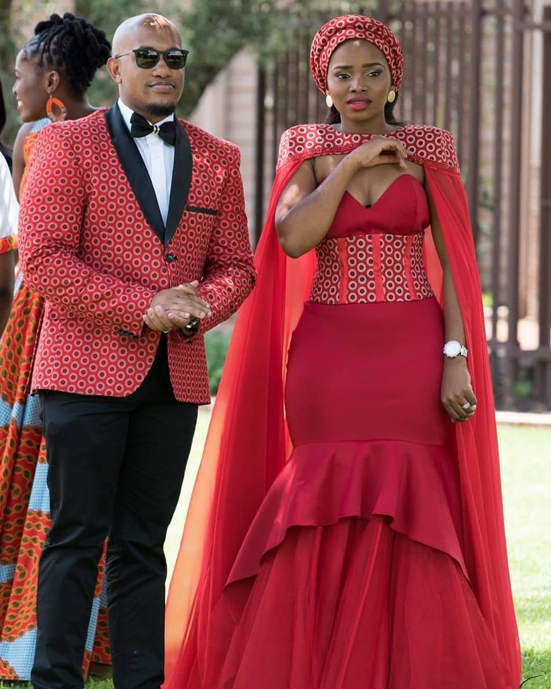 red and black traditional attire